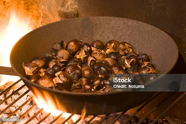 Roasting Chestnuts Stock Photo - Download Image Now - Autumn, Brown, Chestnut - Food