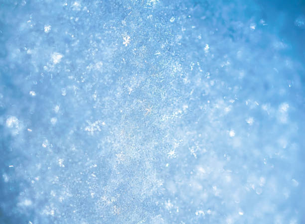 istock Macro background of fresh snowflake texture 1205873305