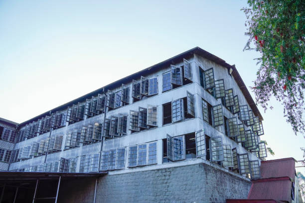 istock Munnar , Kerala / India - January 29, 2020: Lockhart Tea factory building Munnar 1205880836