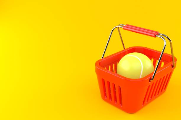 istock Tennis ball inside shopping basket 1205885119