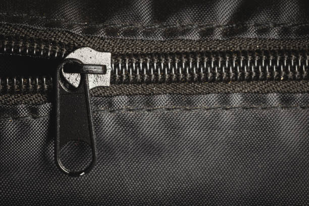 istock Closeup zipper on a black bag detail object 1205887106