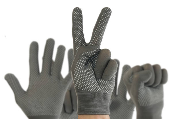 istock one to five fingers hand in glove on white background close-up 1205887263