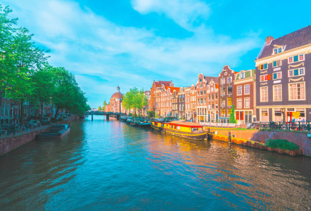 istock Channel in Amsterdam Netherlands houses river Amstel 1205890300