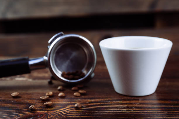 istock A cup of black coffee and filter holder of espresso 1205890608