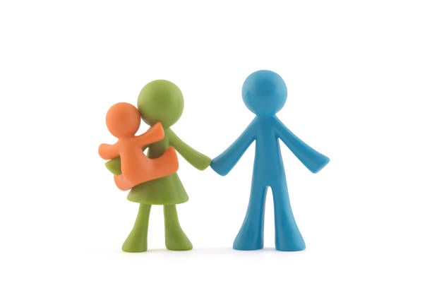istock Colorful family figurines on white background with clipping path 1205892123