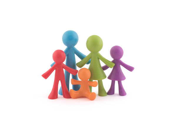 istock Colorful family figurines on white background with clipping path 1205892126