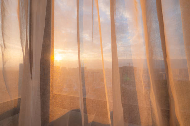 istock Curtain in the morning 1205892358