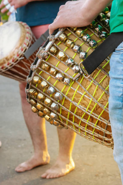 istock African drums there there, men playing Djemba, hands close-up 1205894651