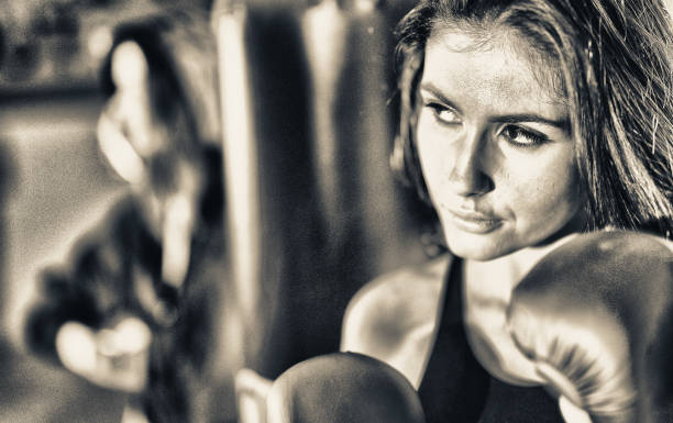 istock Two beautiful girls before kick box match 1205894709