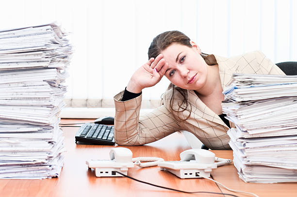 istock Tired woman sitting at the table 120590123
