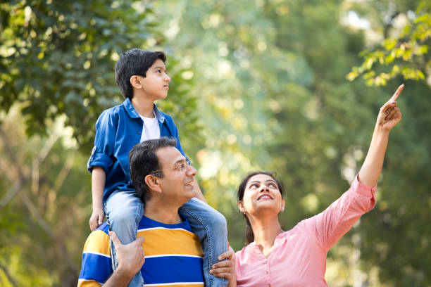 istock Happy family at park 1205903478