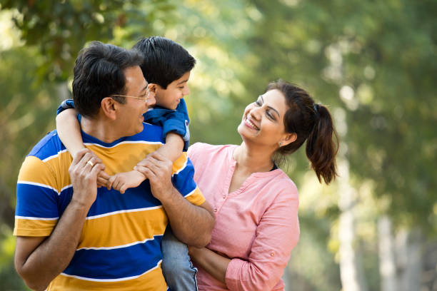 istock Happy family at park 1205903541