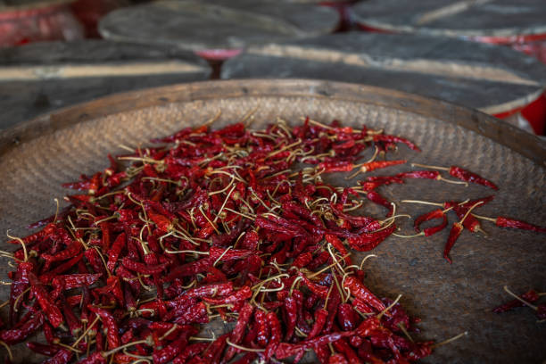 istock Chili drying in a wicker bowl 1205906434