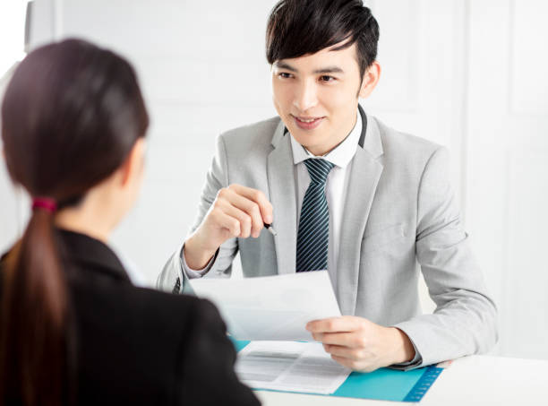 istock Manager Interviewing A Young  businesswoman In Office 1205906741
