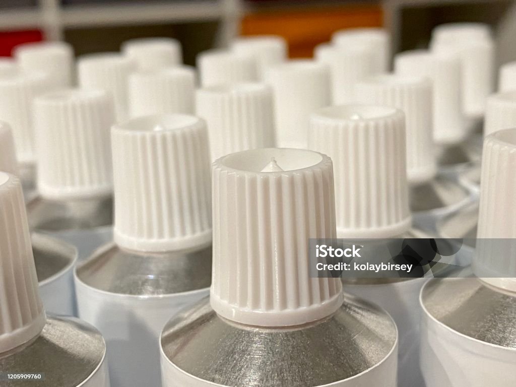 Empty tubes vertical detail close-up Empty tubes with caps photo Blank Stock Photo