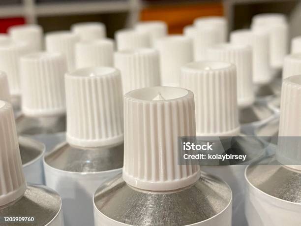 Empty Tubes Vertical Detail Closeup Stock Photo - Download Image Now - Blank, Container, Empty