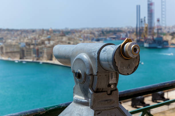 istock The coin-operated monocular points out on a coastal city 1205910974