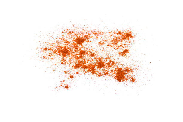 istock Red chili pepper powder isolated on white background 1205911496