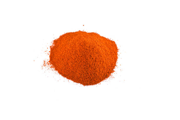 istock Red chili pepper powder isolated on white background 1205911506