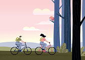 istock Couple riding bicycles 1205916308