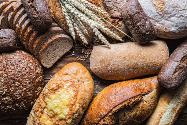istock Still life with breads and wheats, Close-up 1205916762