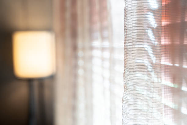 istock red orange pink curtain transperance from outside light with spar aromatherapy mood and tone. 1205916886