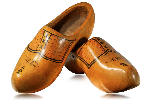 istock Pair of wooden clogs made in Netherlands isolated on white 1205917007