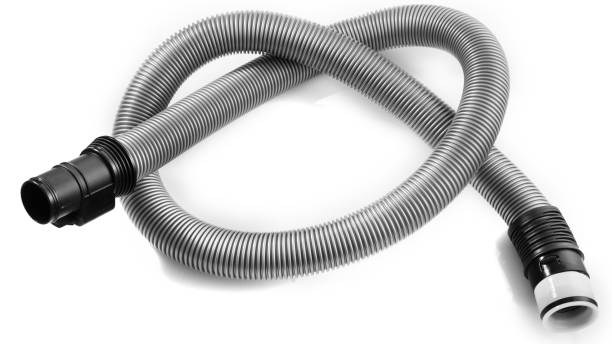 istock Black plastic pipe from a vacuum cleaner on a white background. 1205918478