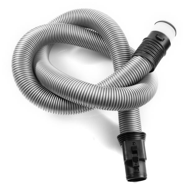 istock Black plastic pipe from a vacuum cleaner on a white background. 1205918500