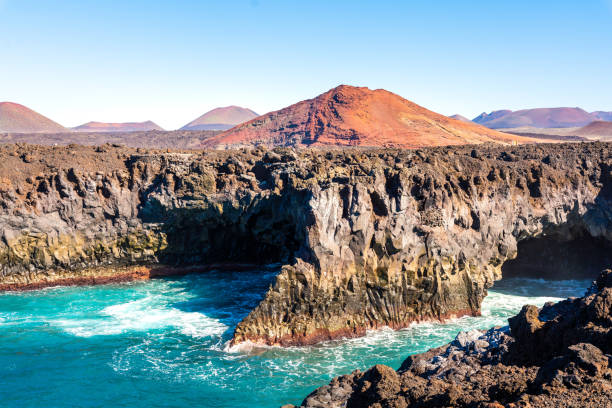 istock Los Hervideros lava cliffs on the Ocean, Lanzarote, Canary Islands 1205919611
