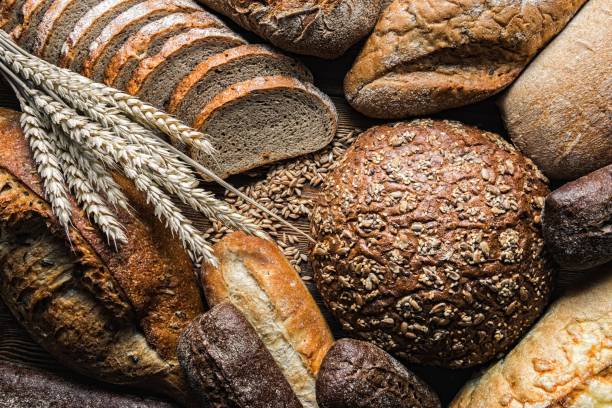 istock Still life with breads and wheats, Close-up 1205919939