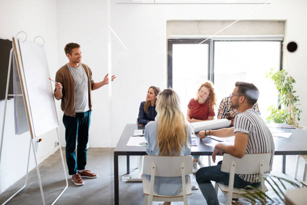 istock Business people designer architects teamwork brainstorming planning meeting concept 1205920913
