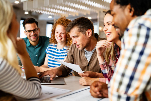 istock Successful group of designers, business people at work in office 1205921179