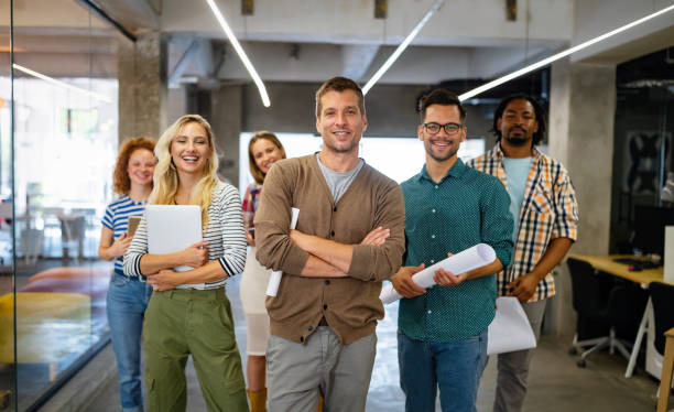 istock Group of successful business people designers architects in office 1205921228