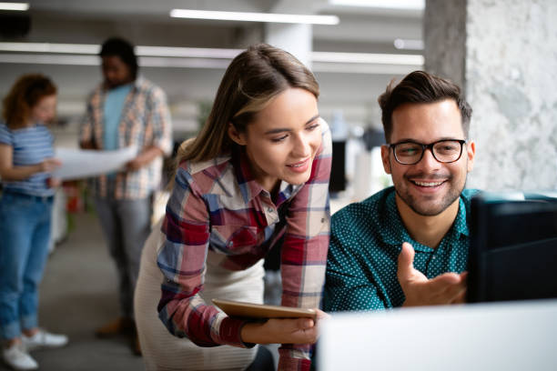 istock Business people brainstorming and chatting at workplace office 1205921414