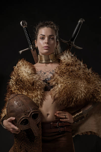istock Blonde viking warrior female in studio shot 1205924726