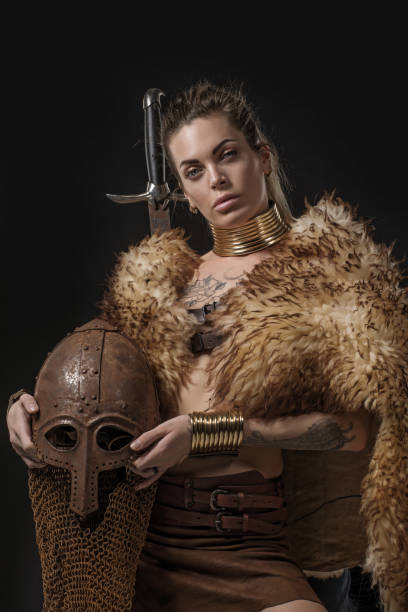 istock Blonde viking warrior female in studio shot 1205925371