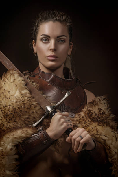 istock Blonde viking warrior female in studio shot 1205925485