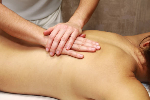 istock therapeutic back massage, details, close-up 1205928361