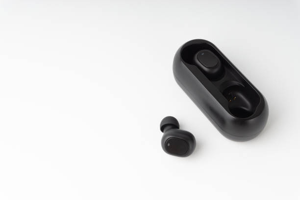 istock Wireless earbuds or earphones on white background 1205932263