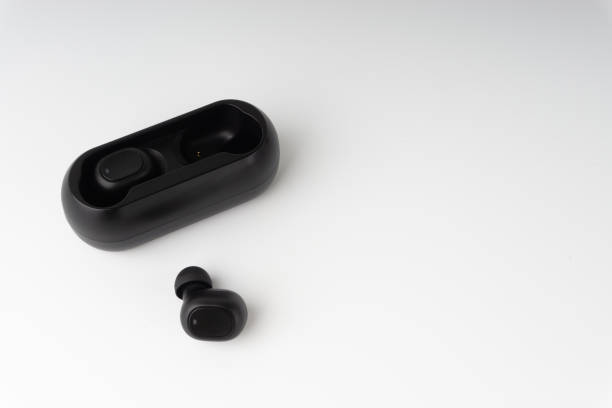 istock Wireless earbuds or earphones on white background 1205932306