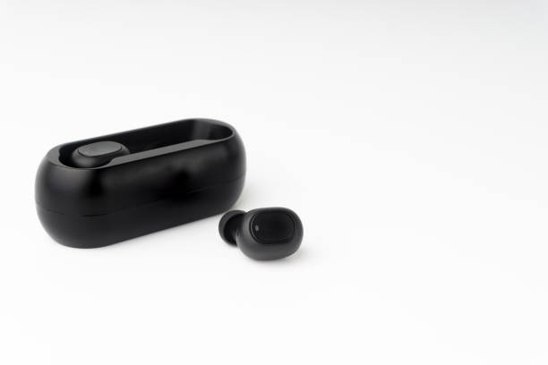 istock Wireless earbuds or earphones on white background 1205932353