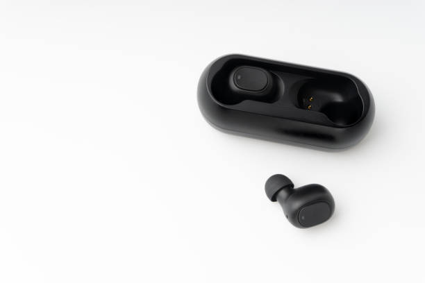 istock Wireless earbuds or earphones on white background 1205932355