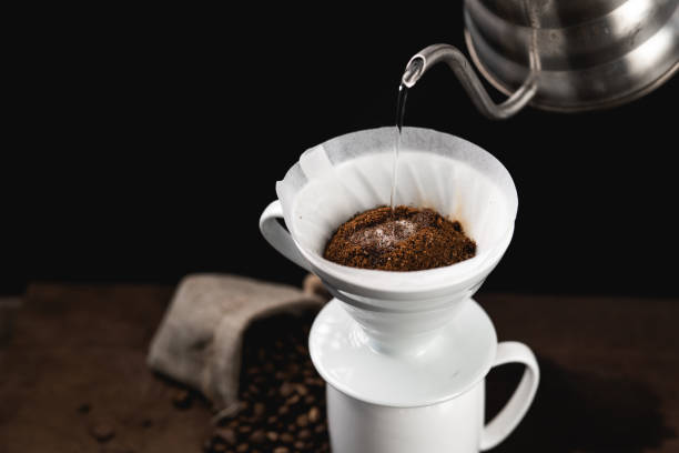 istock Drip coffee - Black coffee poured into a glass in the morning 1205934878