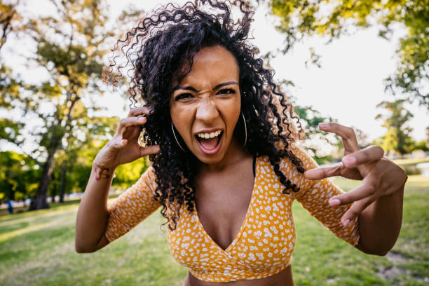istock Hispanic woman shouting and yelling 1205937486