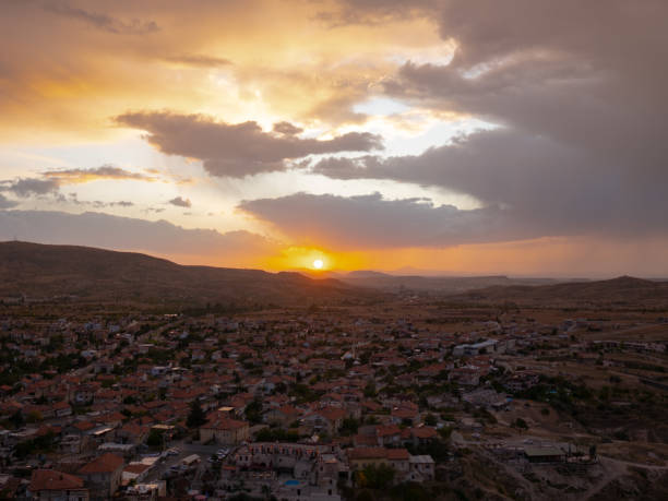 Cappadocia is a semi-arid region in central Turkey, known for its distinctive fairy chimneys, with dwellings carved in to the volcanic rock formations.