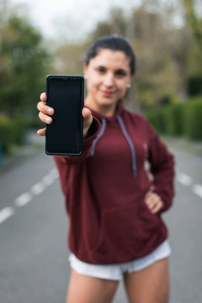 istock Sport and running smartphone app concept 1205939599