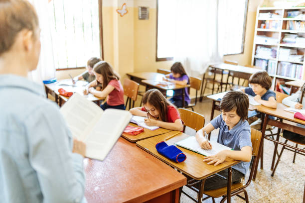istock Latin school children in classroom 1205944188