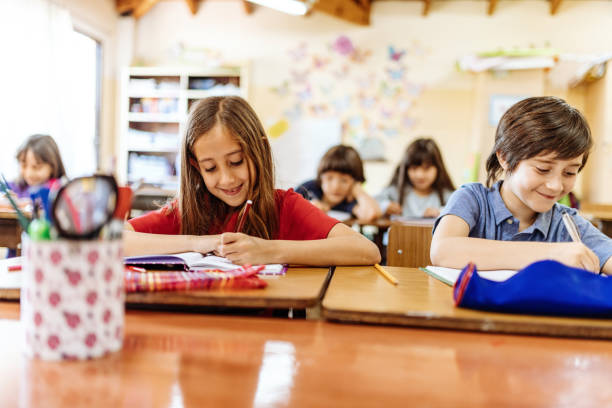 istock Siblings in primary school in Latin America 1205946011