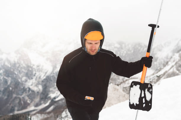 istock Mountain rescue in winter time with avalanche rescue kit 1205947551
